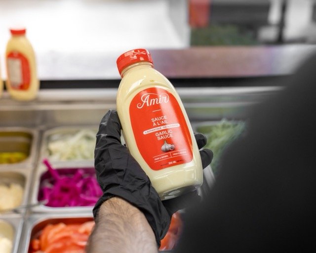 Amir food photography showing a family meal platter.